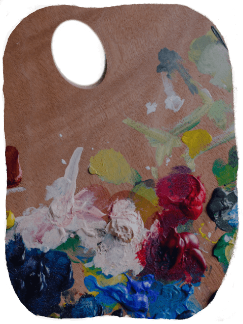 Auf einer Farbpalette aus Holz sind viele bunte Kleckse aus Acrylfarben verteilt.